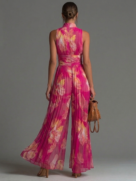 Mono de Chifón Sin Mangas con Cremallera y Pliegues en Color Fucsia con Estampado Floral